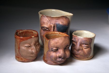 Group of Face Mugs